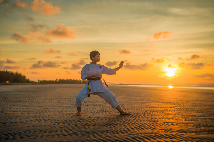 Students practice Kungfu with Shaolin monks, hike Mountain Song, and explore Chinese culture during a school trip to Henan, China.