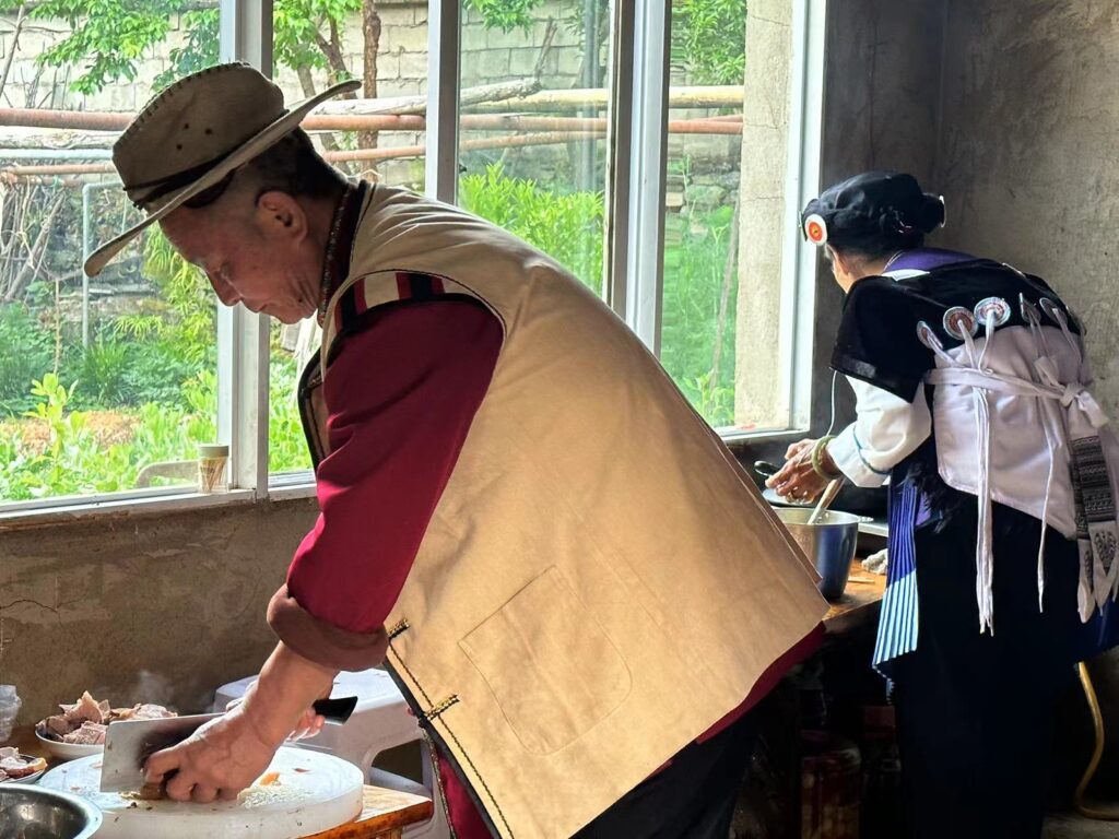 Students experiencing local cuisine and learning about culinary traditions of China's ethnic minorities during an educational tour
