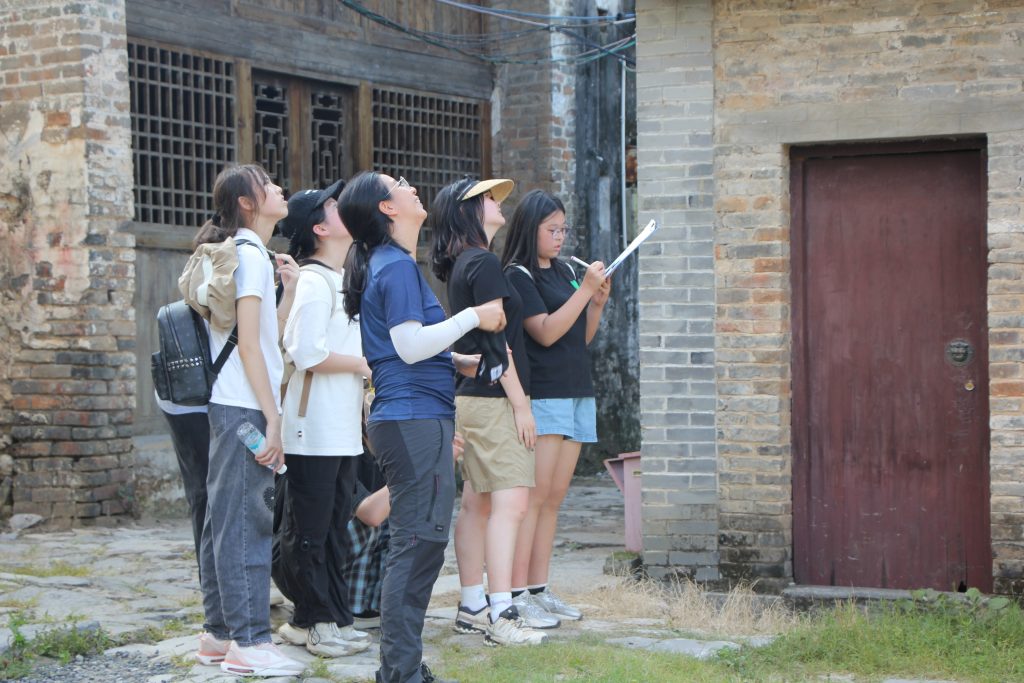 Students on a scavenger hunt in China.