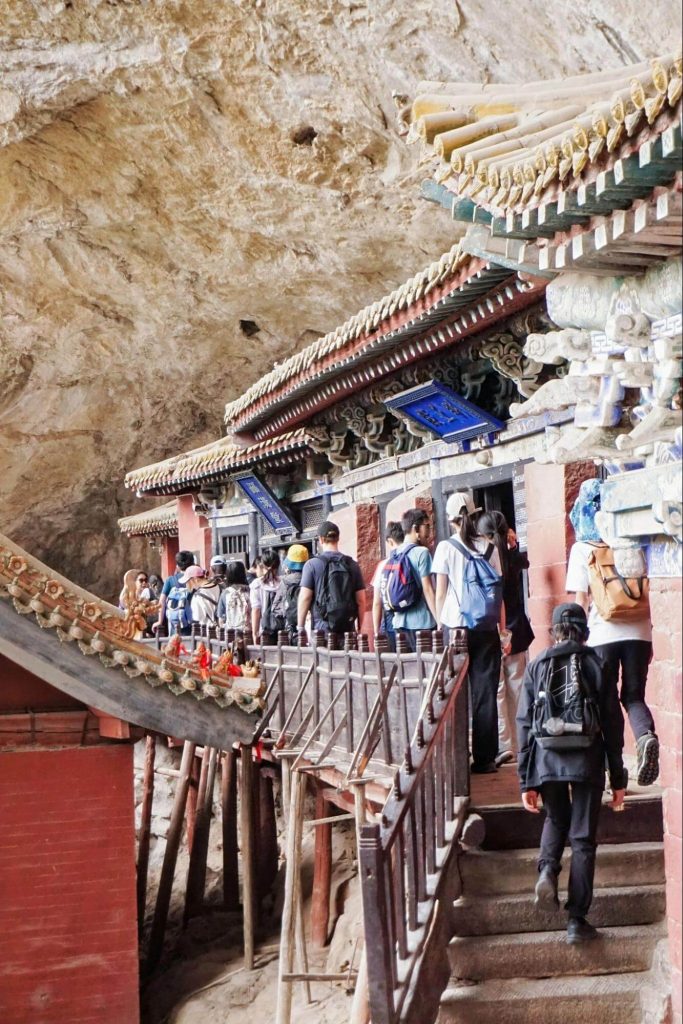 Students exploring a historical site in China