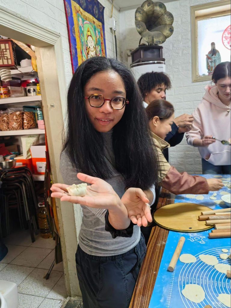 Students observing daily life in China during an educational travel experience.