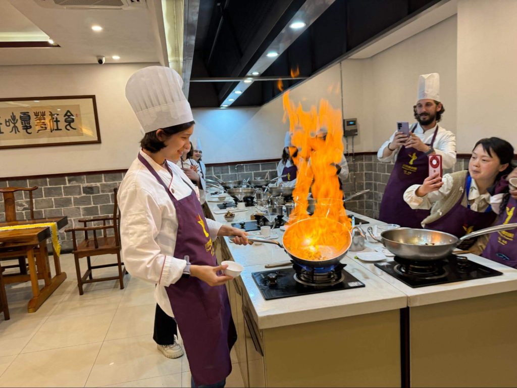 Students learning about food culture and local ingredients during a Chengdu educational program.